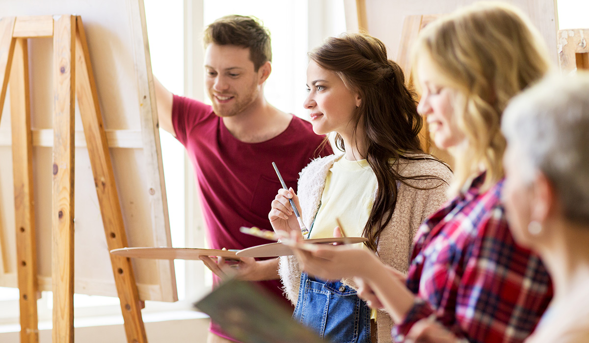 Image of artists discussing their work